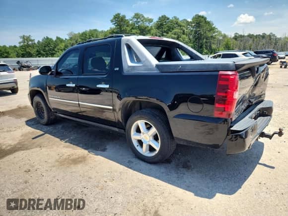 2009 Chevrolet Avalanche LTZ with VIN 3GNFK32049G154794, listed as a Copart auction lot 63452755 with 219,659 mi miles and Salvage title. Bid and sale history available at DreamBid. Image 2.