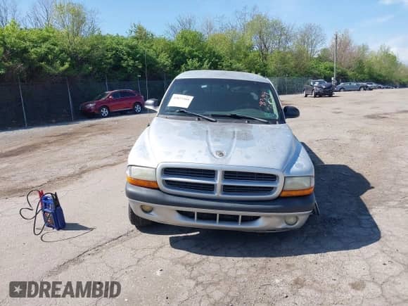 2001 Dodge Dakota with VIN 1B7GG22XX1S348751, listed as a IAAI auction lot 42077395 with 148,034 mi miles and . Bid and sale history available at DreamBid. Image 13.