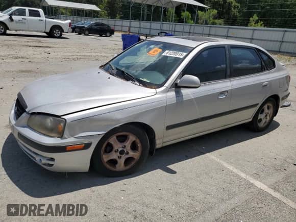 2005 Hyundai Elantra GLS with VIN KMHDN56D25U138578, listed as a Copart auction lot 61220915 with 126,702 mi miles and Salvage title. Bid and sale history available at DreamBid. Image 1.