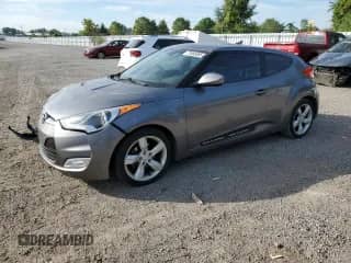 2012 Hyundai Veloster w/Black Int z VIN KMHTC6AD1CU081088, wystawiony jako Copart lot #71685565 z przebiegiem Nie podano mil oraz Szkoda całkowita • Salvage title. Historia ofert i sprzedaży dostępna na DreamBid. Obrazek 1.