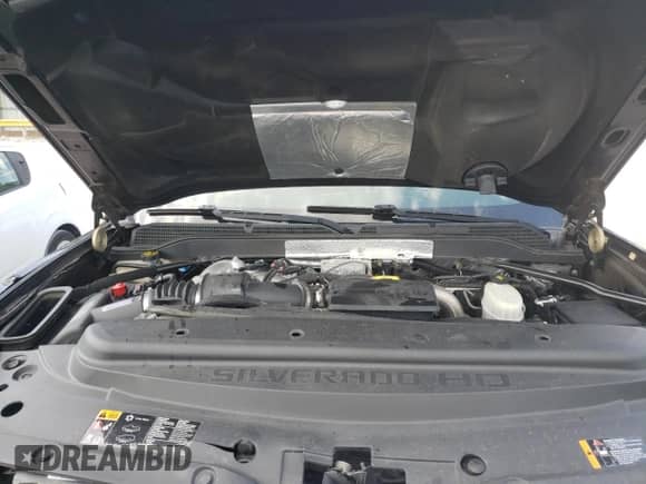 2018 Chevrolet Silverado 2500HD High Country с VIN 1GC1KXEY2JF288673, выставлен на аукционе Copart как лот 45281803 с пробегом Не указан миль и На запчасти • Non repairable. История ставок и продаж доступна на DreamBid. Изображение 13.