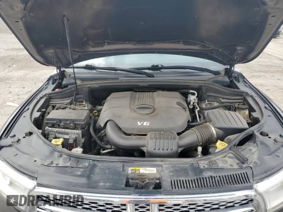 2015 Dodge Durango SXT with VIN 1C4RDHAG4FC784440, listed as a Copart auction lot 71632965 with 177,425 mi miles and Salvage title. Bid and sale history available at DreamBid. Image 12.