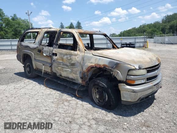 2002 Chevrolet Suburban LT z VIN 3GNGK26G12G301147, wystawiony jako Copart lot #65392395 z przebiegiem Nie podano mil oraz Szkoda całkowita • Salvage title. Historia ofert i sprzedaży dostępna na DreamBid. Obrazek 4.