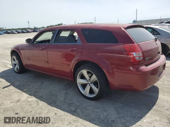 2005 Dodge Magnum SXT with VIN 2D8GZ48V95H537711, listed as a Copart auction lot 58904545 with Not provided miles and Salvage title. Bid and sale history available at DreamBid. Image 2.