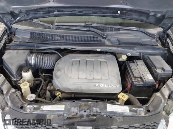 2013 Dodge Grand Caravan SXT z VIN 2C4RDGCGXDR536866, wystawiony jako IAAI lot #43354986 z przebiegiem 205 400 mil mil oraz . Historia ofert i sprzedaży dostępna na DreamBid. Obrazek 10.