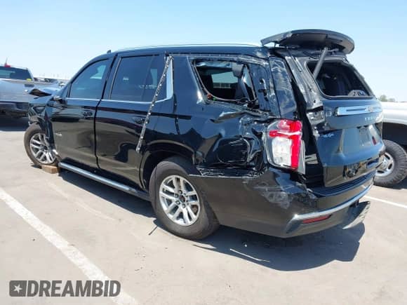 2021 Chevrolet Tahoe LT with VIN 1GNSCNKD5MR263476, listed as a IAAI auction lot 42476434 with 87,770 mi miles and . Bid and sale history available at DreamBid. Image 3.