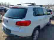 2015 Volkswagen Tiguan S with VIN WVGAV7AX4FW501176, listed as a IAAI auction lot 42983584 with 138,074 mi miles and . Bid and sale history available at DreamBid. Image 4.