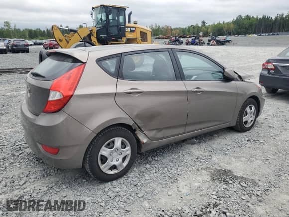 2014 Hyundai Accent GS z VIN KMHCT5AE3EU154502, wystawiony jako Copart lot #68531815 z przebiegiem 296 101 mil mil oraz Nie do naprawy • Non repairable. Historia ofert i sprzedaży dostępna na DreamBid. Obrazek 3.