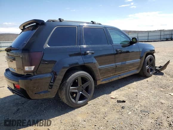 2008 Jeep Grand Cherokee SRT-8 with VIN 1J8HR783X8C157165, listed as a Copart auction lot 49428335 with 134,507 mi miles and Salvage title. Bid and sale history available at DreamBid. Image 3.