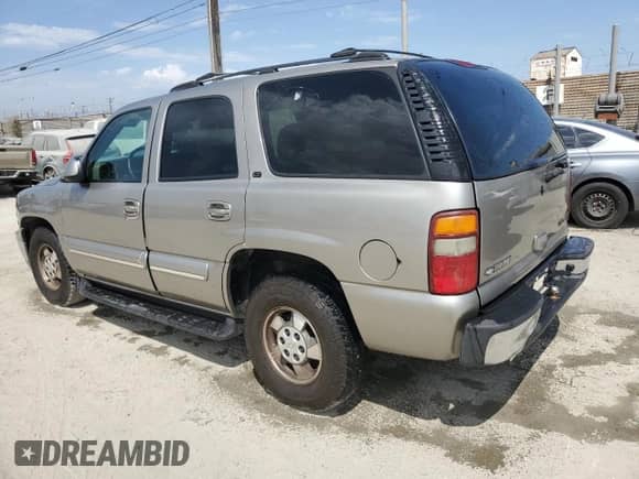 2001 Chevrolet Tahoe LS with VIN 1GNEC13T41R133700, listed as a Copart auction lot 71240535 with 143,051 mi miles and Salvage title. Bid and sale history available at DreamBid. Image 2.