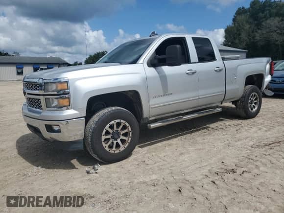 2015 Chevrolet Silverado 1500 LT с VIN 1GCRCREH7FZ287536, выставлен на аукционе Copart как лот 64613545 с пробегом 136 191 миль миль и Списание • Salvage title. История ставок и продаж доступна на DreamBid. Изображение 1.