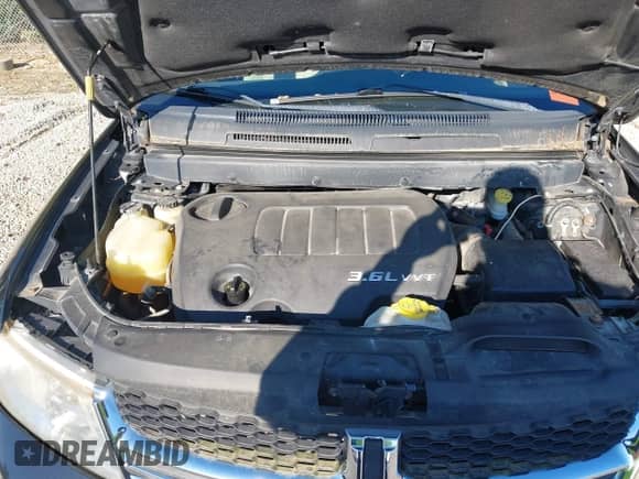 2012 Dodge Journey SXT z VIN 3C4PDDBG1CT342584, wystawiony jako IAAI lot #43156009 z przebiegiem 219 036 mil mil oraz . Historia ofert i sprzedaży dostępna na DreamBid. Obrazek 10.