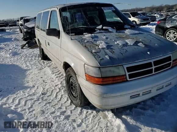1994 Dodge Caravan Grand SE z VIN 1B4GH44R7RX384139, wystawiony jako Copart lot #87722835 z przebiegiem 173 830 mil mil oraz Szkoda całkowita • Salvage title. Historia ofert i sprzedaży dostępna na DreamBid. Obrazek 11.