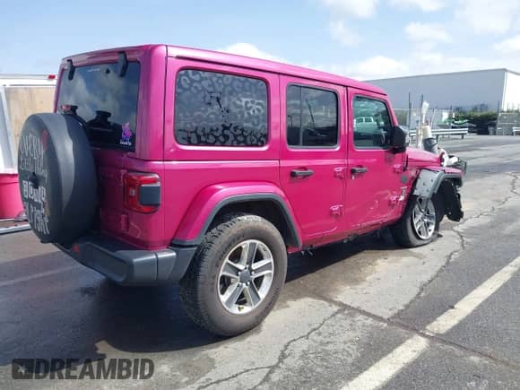 2022 Jeep Wrangler Unlimited Sahara with VIN 1C4HJXEG5NW109153, listed as a IAAI auction lot 41727174 with 41,718 mi miles and . Bid and sale history available at DreamBid. Image 4.