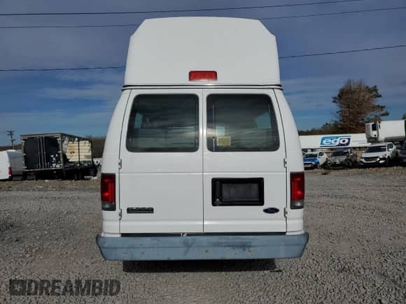 2006 Ford Econoline Cargo z VIN 1FTSS34LX6DA28303, wystawiony jako Copart lot #87123505 z przebiegiem 32 130 mil mil oraz Czysty tytuł • Clean title. Historia ofert i sprzedaży dostępna na DreamBid. Obrazek 6.