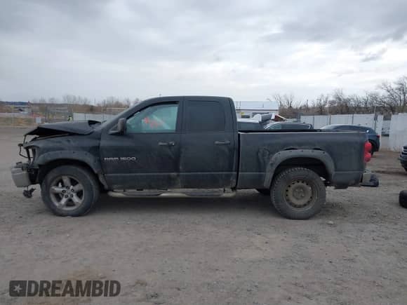 2007 Dodge 1500 SLT with VIN 1D7HU18247S192403, listed as a IAAI auction lot 41058980 with 242,440 mi miles and . Bid and sale history available at DreamBid. Image 15.