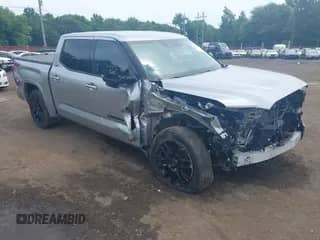 2022 Toyota Tundra SR5 with VIN 5TFLA5DB7NX042800, listed as a IAAI auction lot 42785778 with 21,073 mi miles and . Bid and sale history available at DreamBid. Image 1.