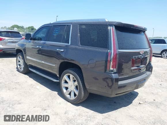 2017 Cadillac Escalade Luxury z VIN 1GYS3BKJ8HR259936, wystawiony jako IAAI lot #42301926 z przebiegiem 70 879 mil mil oraz . Historia ofert i sprzedaży dostępna na DreamBid. Obrazek 3.