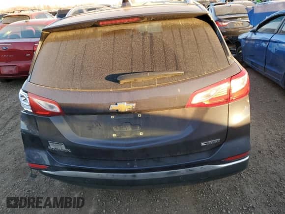 2018 Chevrolet Equinox Premier with VIN 3GNAXMEV6JS599306, listed as a Copart auction lot 83366874 with 75,332 mi miles and Salvage title. Bid and sale history available at DreamBid. Image 6.