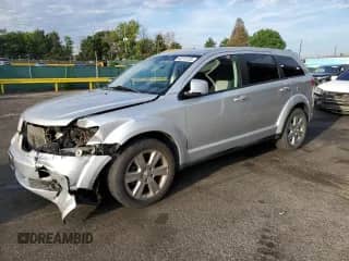 2009 Dodge Journey SXT with VIN 3D4GH57V09T508350, listed as a Copart auction lot 66213735 with 149,765 mi miles and Salvage title. Bid and sale history available at DreamBid. Image 1.