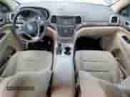 2016 Jeep Grand Cherokee Laredo with VIN 1C4RJEAG0GC415440, listed as a Copart auction lot 66015565 with 174,494 mi miles and Salvage title. Bid and sale history available at DreamBid. Image 8.