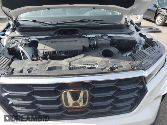 2023 Honda Pilot Touring с VIN 5FNYG2H71PB002492, выставлен на аукционе Copart как лот 41790915 с пробегом 18 450 миль миль и Списание • Salvage title. История ставок и продаж доступна на DreamBid. Изображение 12.