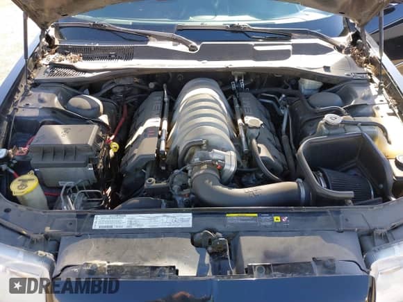 2006 Chrysler 300 C SRT-8 with VIN 2C3LA73W86H388896, listed as a IAAI auction lot 40599030 with 152,547 mi miles and . Bid and sale history available at DreamBid. Image 10.