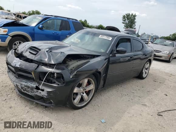2007 Dodge Charger SRT-8 с VIN 2B3KA73W07H809178, выставлен на аукционе Copart как лот 60517385 с пробегом Не указан миль и Списание • Salvage title. История ставок и продаж доступна на DreamBid. Изображение 1.