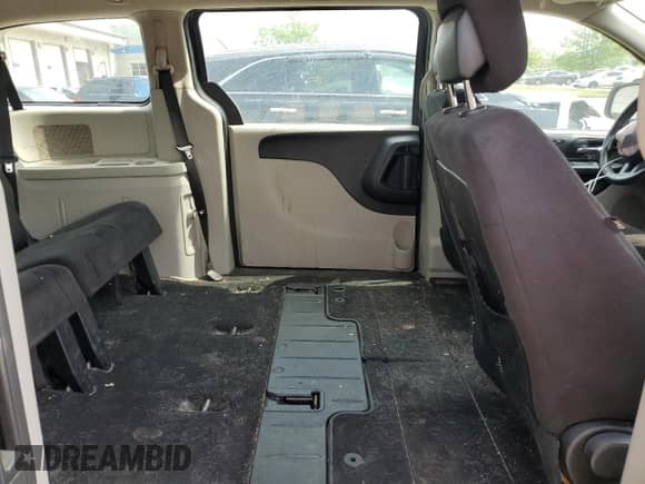 2013 Dodge Grand Caravan American Value с VIN 2C4RDGBG0DR765140, выставлен на аукционе Copart как лот 55219745 с пробегом 119 987 миль миль и Списание • Salvage title. История ставок и продаж доступна на DreamBid. Изображение 11.