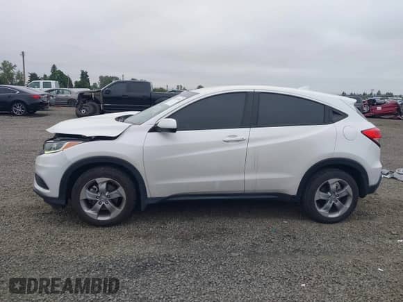 2020 Honda HR-V LX z VIN 3CZRU6H39LM716386, wystawiony jako IAAI lot #42574450 z przebiegiem 80 316 mil mil oraz . Historia ofert i sprzedaży dostępna na DreamBid. Obrazek 15.