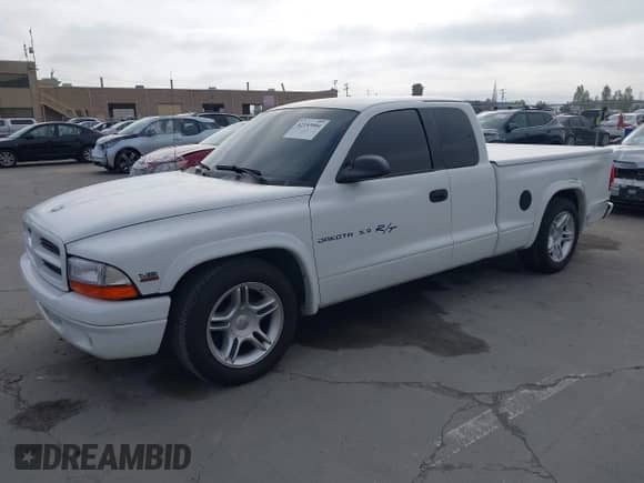 2000 Dodge Dakota Sport with VIN 1B7GL22ZXYS526021, listed as a IAAI auction lot 42153004 with 67,542 mi miles and . Bid and sale history available at DreamBid. Image 2.