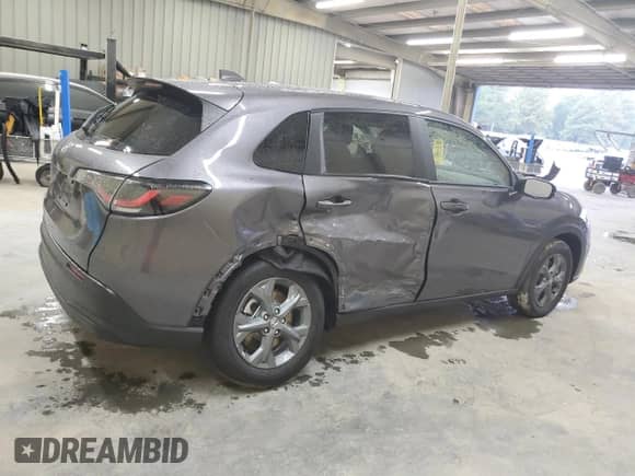 2026 Honda HR-V LX with VIN 3CZRZ1H36TM709593, listed as a Copart auction lot 80054055 with 592 mi miles and Salvage title. Bid and sale history available at DreamBid. Image 3.