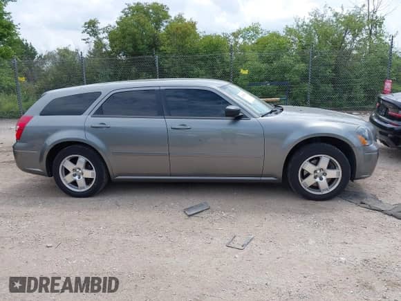 2005 Dodge Magnum SXT with VIN 2D4GZ48V35H574786, listed as a IAAI auction lot 42732869 with 120,414 mi miles and . Bid and sale history available at DreamBid. Image 13.