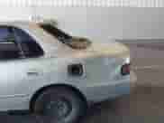 1994 Toyota Camry LE z VIN 4T1SK12EXRU336239, wystawiony jako IAAI lot #43305210 z przebiegiem 184 899 mil mil oraz . Historia ofert i sprzedaży dostępna na DreamBid. Obrazek 6.