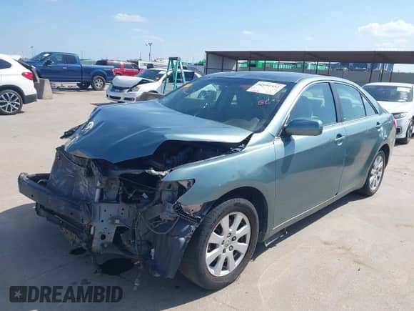 2009 Toyota Camry with VIN 4T1BE46K39U900919, listed as a IAAI auction lot 42691552 with 171,028 mi miles and . Bid and sale history available at DreamBid. Image 2.