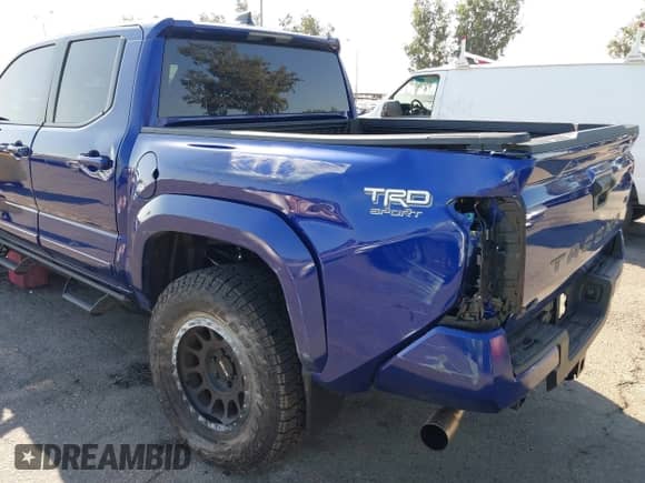 2024 Toyota Tacoma TRD Off Road with VIN 3TMLB5JN8RM074856, listed as a IAAI auction lot 43139396 with 8,137 mi miles and . Bid and sale history available at DreamBid. Image 17.