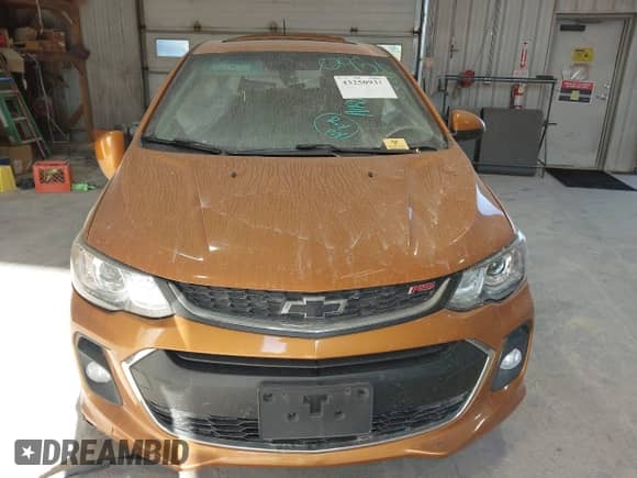 2019 Chevrolet Sonic LT z VIN 1G1JD6SBXK4117812, wystawiony jako IAAI lot #43250931 z przebiegiem Nie podano mil oraz . Historia ofert i sprzedaży dostępna na DreamBid. Obrazek 12.