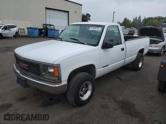 1997 GMC Sierra 1500 z VIN 1GTEK14W6VZ549578, wystawiony jako Copart lot #67808705 z przebiegiem 203 467 mil mil oraz Czysty tytuł • Clean title. Historia ofert i sprzedaży dostępna na DreamBid. Obrazek 1.