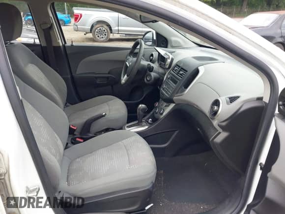 2016 Chevrolet Sonic LS with VIN 1G1JA5SH0G4110253, listed as a IAAI auction lot 42601036 with 63,495 mi miles and . Bid and sale history available at DreamBid. Image 5.