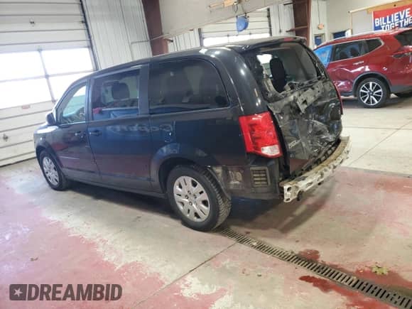 2017 Dodge Grand Caravan SE Plus with VIN 2C4RDGBG2HR567567, listed as a Copart auction lot 82450605 with 118,816 mi miles and Salvage title. Bid and sale history available at DreamBid. Image 2.