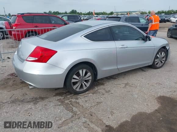 2011 Honda Accord EX with VIN 1HGCS1B79BA010533, listed as a IAAI auction lot 42673916 with 230,490 mi miles and . Bid and sale history available at DreamBid. Image 4.