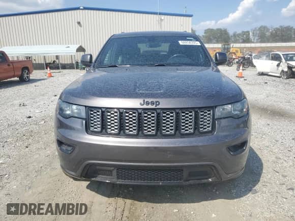 2019 Jeep Grand Cherokee Laredo E with VIN 1C4RJEAG6KC625923, listed as a Copart auction lot 68858395 with 121,517 mi miles and Salvage title. Bid and sale history available at DreamBid. Image 5.