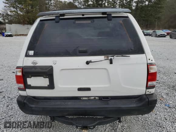 1997 Nissan Pathfinder XE z VIN JN8AR05Y5VW139347, wystawiony jako Copart lot #88507665 z przebiegiem Nie podano mil oraz Szkoda całkowita • Salvage title. Historia ofert i sprzedaży dostępna na DreamBid. Obrazek 6.