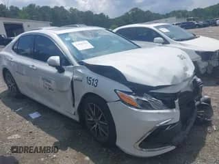 2021 Toyota Camry Hybrid XLE with VIN 4T1F31AK5MU558850, listed as a IAAI auction lot 42880569 with 223,141 mi miles and . Bid and sale history available at DreamBid. Image 1.