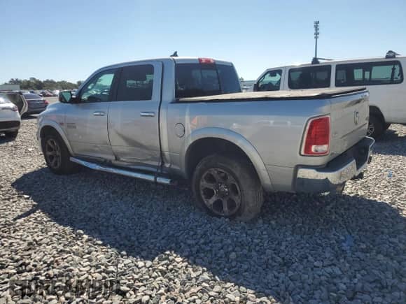 2015 Ram 1500 Laramie z VIN 1C6RR7NT5FS730886, wystawiony jako Copart lot #82410115 z przebiegiem 245 301 mil mil oraz Szkoda całkowita • Salvage title. Historia ofert i sprzedaży dostępna na DreamBid. Obrazek 2.
