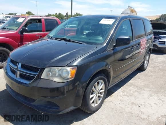 2014 Dodge Grand Caravan SXT 30th Anniversary with VIN 2C4RDGCG7ER392484, listed as a IAAI auction lot 42842133 with 163,973 mi miles and . Bid and sale history available at DreamBid. Image 2.