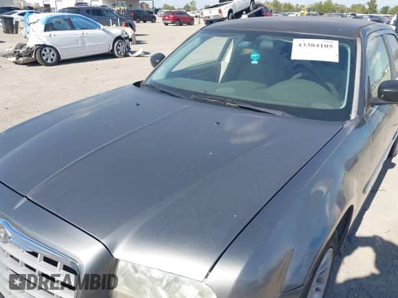 2009 Chrysler 300 LX with VIN 2C3KA43D89H505437, listed as a IAAI auction lot 43384105 with Not provided miles and . Bid and sale history available at DreamBid. Image 6.