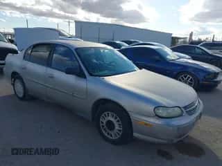 2004 Chevrolet Malibu Classic z VIN 1G1ND52F34M589464, wystawiony jako IAAI lot #41566346 z przebiegiem 128 084 mil mil oraz . Historia ofert i sprzedaży dostępna na DreamBid. Obrazek 1.