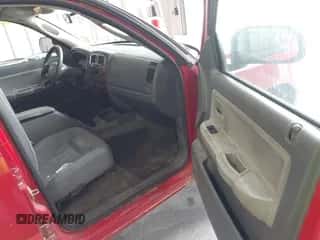 2005 Dodge Dakota SLT with VIN 1D7HW48N65S366085, listed as a IAAI auction lot 43206475 with 187,820 mi miles and . Bid and sale history available at DreamBid. Image 5.