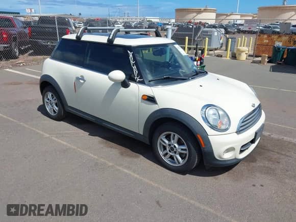 2012 MINI Hardtop with VIN WMWSU3C50CT255544, listed as a IAAI auction lot 42533243 with 102,422 mi miles and . Bid and sale history available at DreamBid. Image 1.